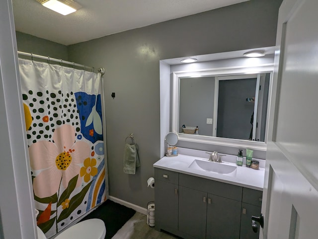 674 Booth Rd, Bronson, MI 49028 - full bath with vanity, baseboards, a shower with curtain, and toilet