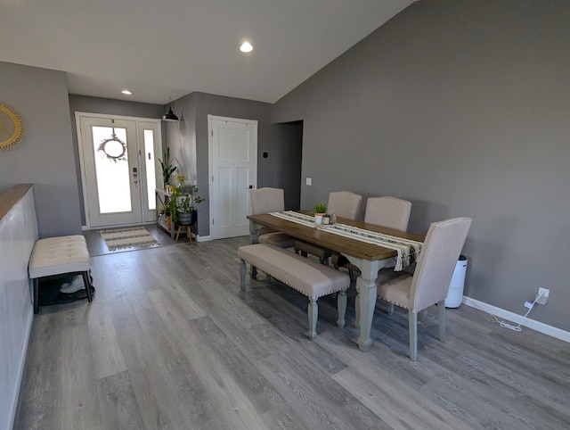 674 Booth Rd, Bronson, MI 49028 - dining space featuring recessed lighting, baseboards, vaulted ceiling, and wood finished floors