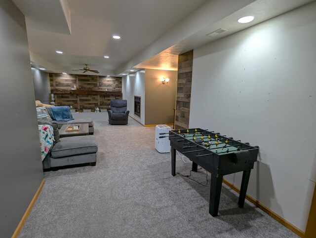 674 Booth Rd, Bronson, MI 49028 - recreation room with carpet floors, baseboards, a ceiling fan, and recessed lighting