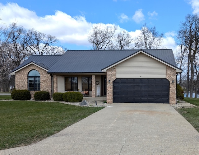 674 Booth Rd, Bronson, MI 49028 - ranch-style house with driveway, an attached garage, a front yard, brick siding, and metal roof