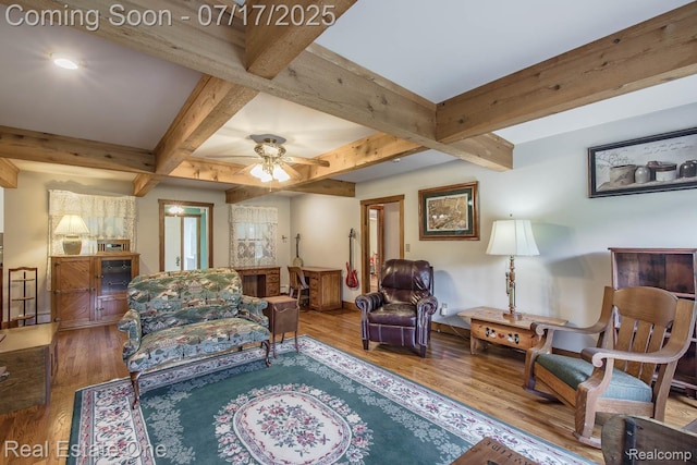 727 Romeo Rd, Rochester, MI 48307 - living area with wood finished floors, beam ceiling, a ceiling fan, and coffered ceiling