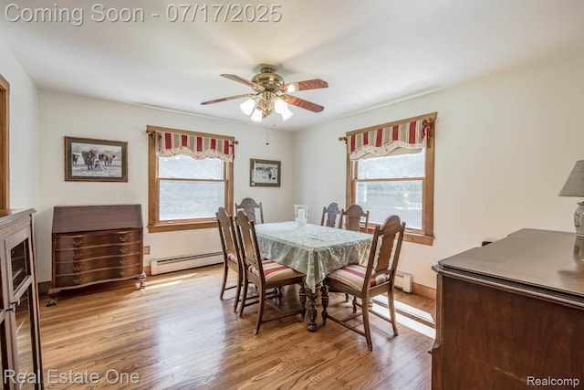 727 Romeo Rd, Rochester, MI 48307 - dining space featuring plenty of natural light, a ceiling fan, light wood-style flooring, and baseboard heating