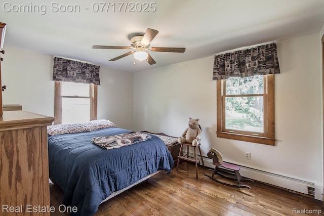 727 Romeo Rd, Rochester, MI 48307 - bedroom with multiple windows, baseboard heating, wood finished floors, and ceiling fan