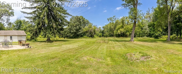 727 Romeo Rd, Rochester, MI 48307 - view of grassy yard with a patio area
