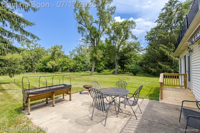 727 Romeo Rd, Rochester, MI 48307 - view of patio with outdoor dining area and view of wooded area