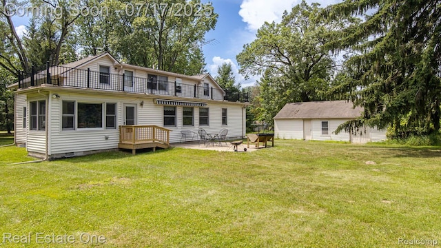 727 Romeo Rd, Rochester, MI 48307 - rear view of house with a balcony, a lawn, a patio area, and crawl space