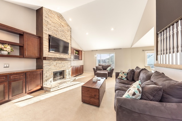 living room featuring light carpet, a fireplace, high vaulted ceiling, and baseboards