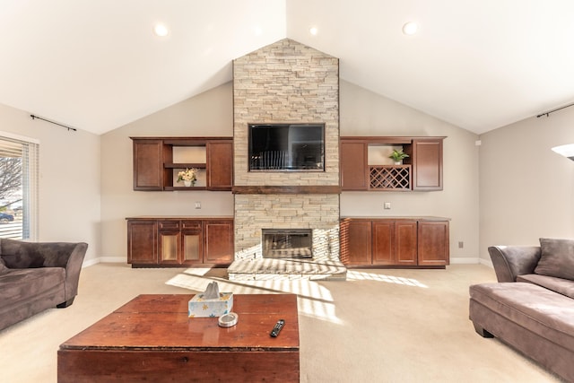 living area featuring light carpet, high vaulted ceiling, recessed lighting, a fireplace, and baseboards