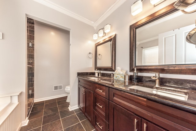 full bath with a sink, visible vents, toilet, and ornamental molding