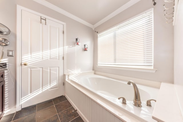 bathroom with a bath and ornamental molding