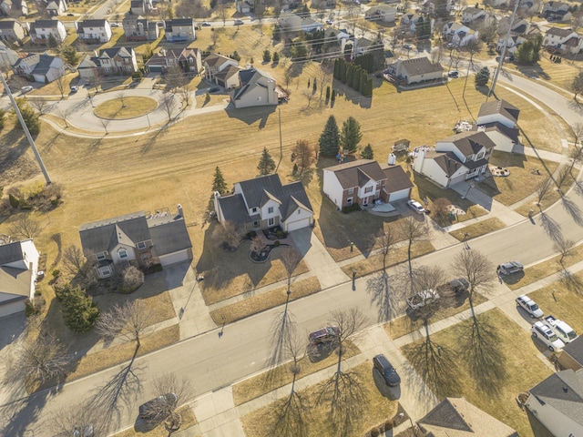 birds eye view of property with a residential view