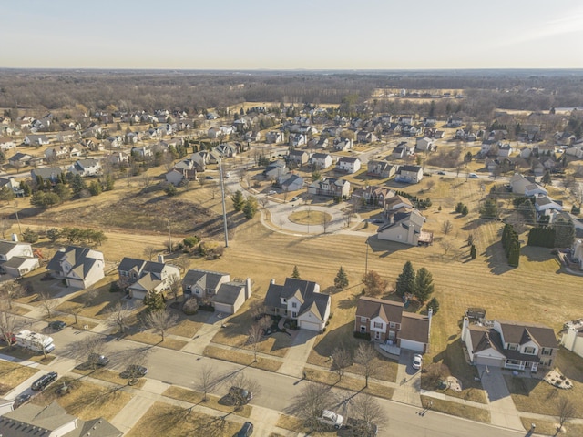 birds eye view of property with a residential view