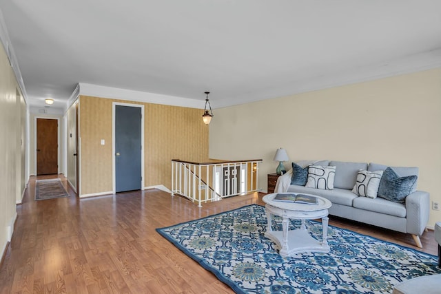 living room featuring wood finished floors and baseboards