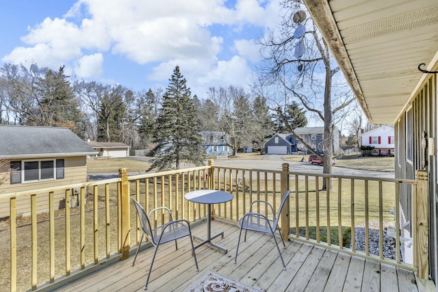 wooden deck with a residential view