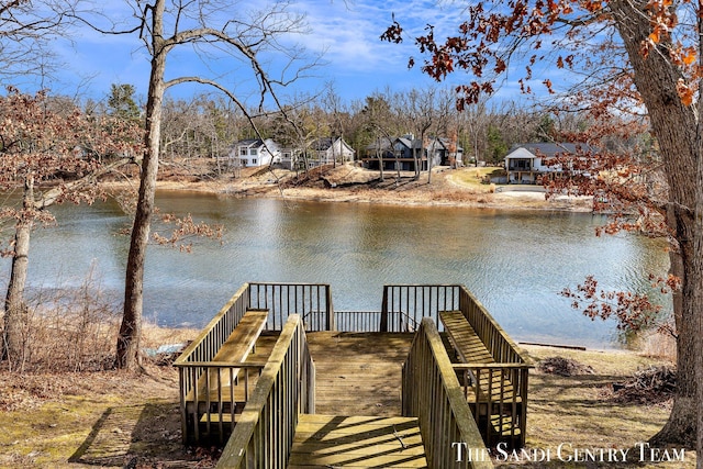 dock area with a water view