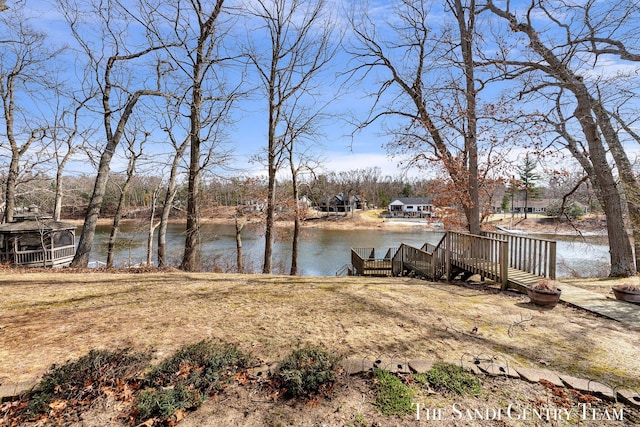 view of yard with a water view