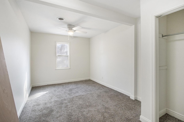 unfurnished bedroom with baseboards, visible vents, and carpet floors