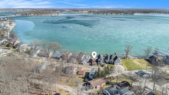 bird's eye view featuring a residential view and a water view