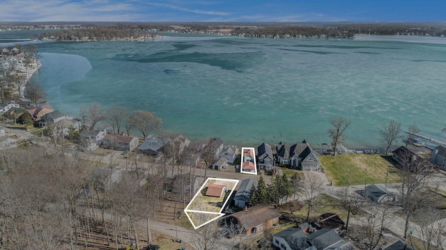 22175 Forest Hall Dr, Cassopolis, MI 49031 - aerial perspective of suburban area with a nearby body of water and property parcel outlined