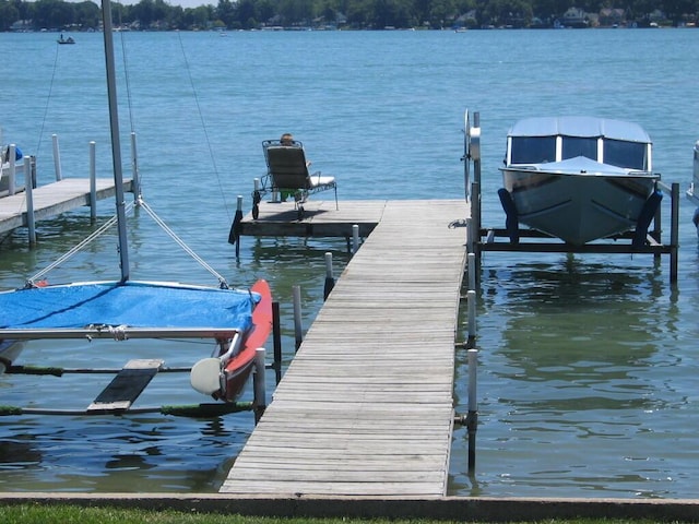 22175 Forest Hall Dr, Cassopolis, MI 49031 - dock featuring boat lift and a water view
