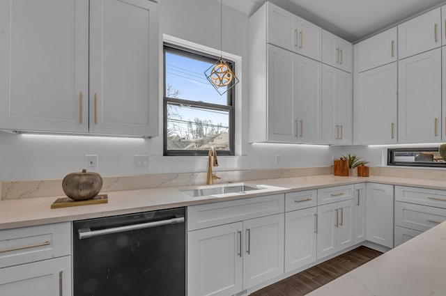 kitchen with a sink, dark wood-type flooring, dishwasher, and white cabinets