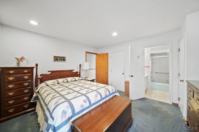 bedroom featuring recessed lighting, ensuite bathroom, and dark carpet