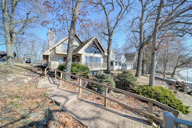 exterior space featuring a chimney