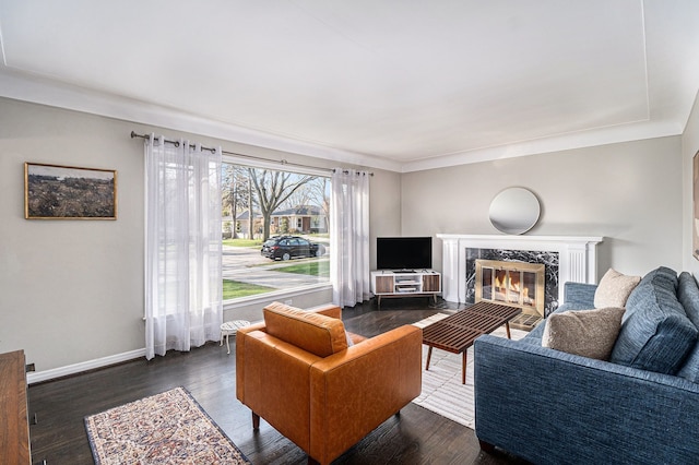 3018 Guilford Dr, Royal Oak, MI 48073 - living area featuring wood finished floors, a fireplace, and baseboards