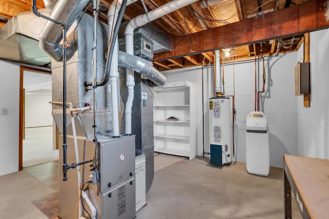 utility room featuring water heater