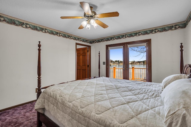 carpeted bedroom with access to exterior, a ceiling fan, baseboards, and a water view