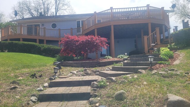 4210 Dawn Dr, Hillsdale, MI 49242 - rear view of property featuring a wooden deck, stairs, and a yard