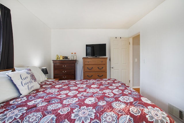 bedroom with visible vents