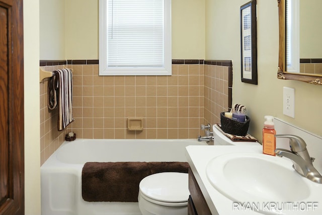 full bath featuring vanity, toilet, and a tub to relax in