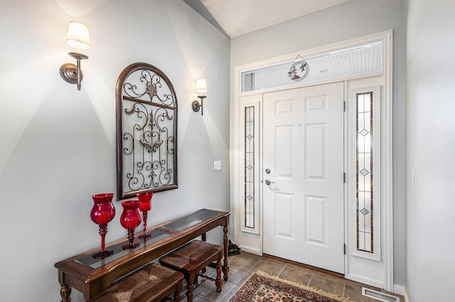 foyer featuring visible vents