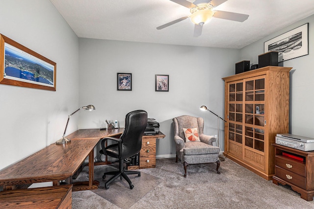 office featuring ceiling fan and carpet