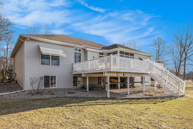 rear view of property with stairway, a lawn, roof with shingles, and a wooden deck