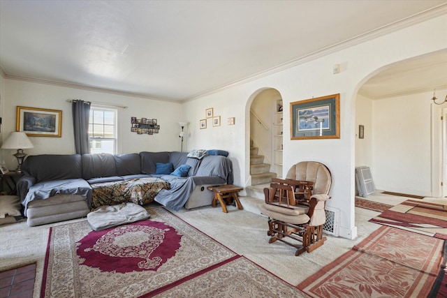 living area featuring stairs, crown molding, arched walkways, and carpet floors