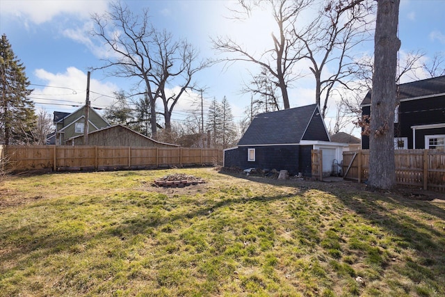 view of yard with a fenced backyard