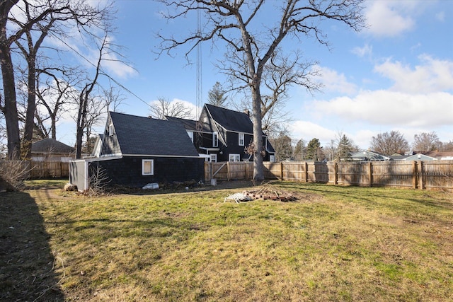 view of yard with a fenced backyard