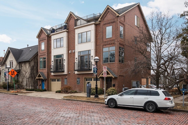 view of front of home with brick siding