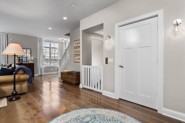 interior space with recessed lighting, baseboards, and wood finished floors