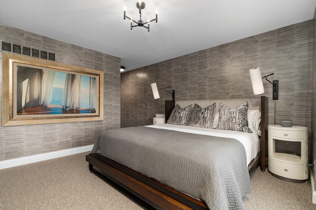 bedroom with wallpapered walls, baseboards, an inviting chandelier, and carpet floors