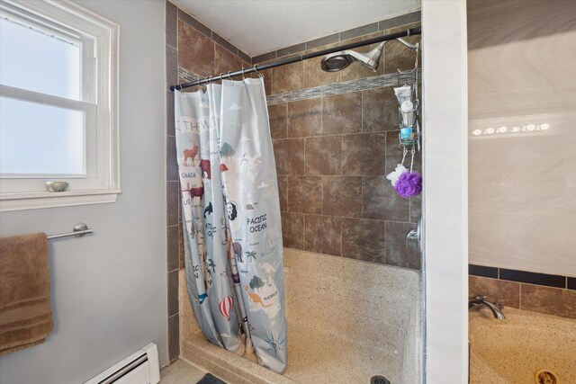 full bathroom with baseboard heating and a stall shower