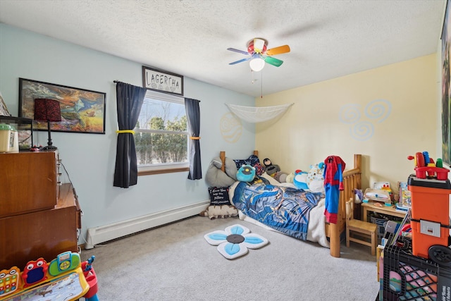 carpeted bedroom with baseboard heating, a textured ceiling, and ceiling fan