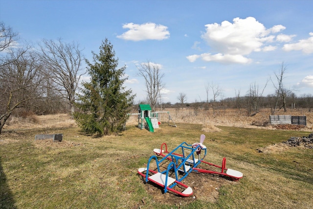 view of playground with a yard