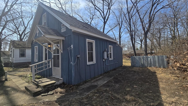 view of outdoor structure with fence