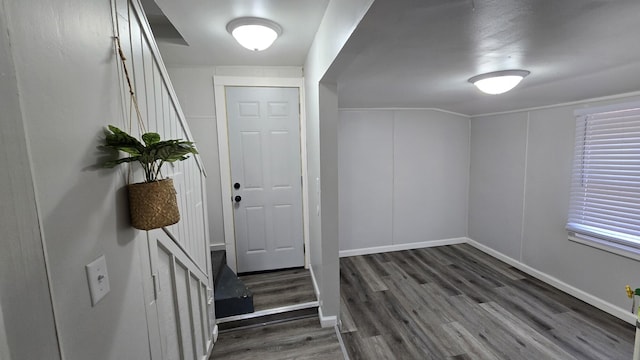 entrance foyer with wood finished floors and baseboards