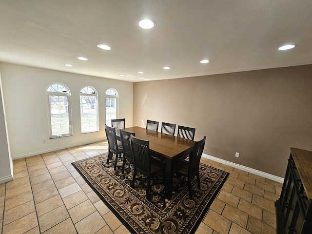 dining room featuring recessed lighting and baseboards