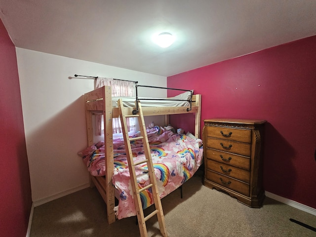 carpeted bedroom with baseboards