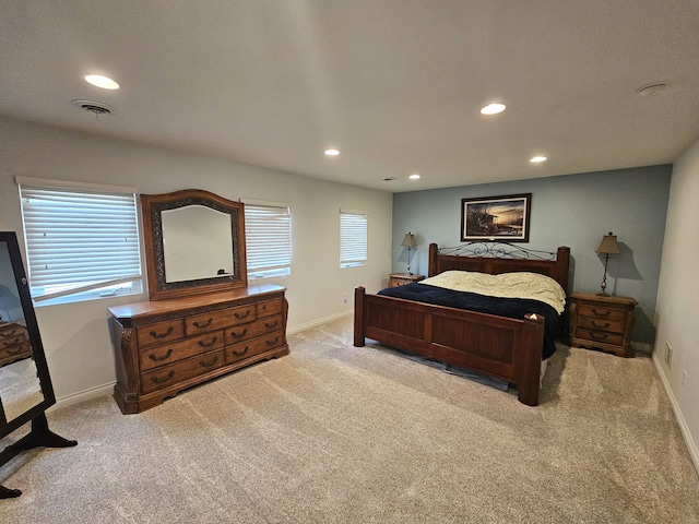 bedroom with recessed lighting, carpet flooring, visible vents, and baseboards